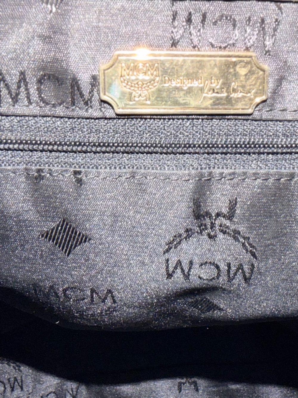 MCM Black Leather Backpack with Gold Logo Accents - Picture 9 of 11